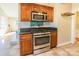 Kitchen boasts granite counters and stainless steel appliances at 549 Spring Sw St, Concord, NC 28025