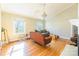 Bright living room features hardwood floors, a fireplace, and ample natural light at 549 Spring Sw St, Concord, NC 28025