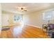 Living Room with hardwood floors and large windows at 549 Spring Sw St, Concord, NC 28025