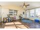 Bright sunroom featuring a ceiling fan at 549 Spring Sw St, Concord, NC 28025