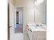 Bathroom with double vanity, tiled floors and access to bedroom at 9605 Pointer Rd # 78, Huntersville, NC 28078