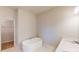 Bright bathroom features a soaking tub, walk-in closet access and single sink vanity at 9605 Pointer Rd # 78, Huntersville, NC 28078