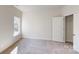 This bedroom features a window providing natural light and a standard closet at 9605 Pointer Rd # 78, Huntersville, NC 28078