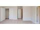 This bedroom features a standard closet and is located near another bedroom at 9605 Pointer Rd # 78, Huntersville, NC 28078