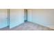 This bedroom features a standard closet and carpeted flooring at 9605 Pointer Rd # 78, Huntersville, NC 28078