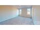 Spacious bedroom with two windows and carpet floors at 9605 Pointer Rd # 78, Huntersville, NC 28078