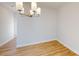 Simple dining area with hardwood floors and lots of natural light at 9605 Pointer Rd # 78, Huntersville, NC 28078