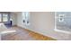 Bright, open living area featuring hardwood floors and large windows at 9605 Pointer Rd # 78, Huntersville, NC 28078
