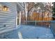 Back deck with a light blue painted floor featuring an exterior light at 9709 Calpher Ct, Matthews, NC 28105