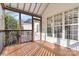 Relaxing screened-in porch with wood flooring and multiple windows at 10302 Sawtimber Ct, Huntersville, NC 28078