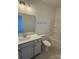 Modern bathroom with gray vanity, bathtub, and tiled floor at 11112 Lochmere Rd, Charlotte, NC 28278