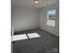 Spacious bedroom with carpet and window at 11112 Lochmere Rd, Charlotte, NC 28278