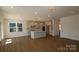 Open concept kitchen with island and breakfast area at 11112 Lochmere Rd, Charlotte, NC 28278