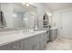 Spa-like bathroom with double vanity, large mirror, and walk-in shower at 1117 Churchill Commons Dr, Charlotte, NC 28211