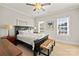 Serene bedroom with neutral colors, plantation shutters, and a comfortable bed at 1117 Churchill Commons Dr, Charlotte, NC 28211