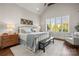 Spacious bedroom with a large window and hardwood floors at 1117 Churchill Commons Dr, Charlotte, NC 28211