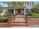 Brick walkway leading to a charming front entry with double doors at 1117 Churchill Commons Dr, Charlotte, NC 28211