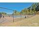 Community basketball court with chain link fence at 11828 Bending Branch Rd # 42, Charlotte, NC 28227