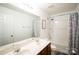 Clean bathroom with double vanity, tub, and shower at 11828 Bending Branch Rd # 42, Charlotte, NC 28227