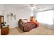 Cozy bedroom with daybed and large window providing natural light at 11828 Bending Branch Rd # 42, Charlotte, NC 28227