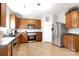 Modern kitchen, stainless steel appliances, and ample wood cabinetry at 11828 Bending Branch Rd # 42, Charlotte, NC 28227