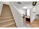 Carpeted staircase leading to the upper level of the home at 11828 Bending Branch Rd # 42, Charlotte, NC 28227