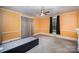 Bright bedroom with ceiling fan and window at 302 Charlotte St, York, SC 29745