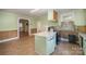 Kitchen boasts an island and a pantry at 302 Charlotte St, York, SC 29745