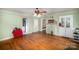 Living room with hardwood floors, built-ins and fireplace at 302 Charlotte St, York, SC 29745