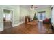 Spacious living room featuring hardwood floors and a fireplace at 302 Charlotte St, York, SC 29745