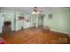 Living area with hardwood floors and a view to the kitchen at 302 Charlotte St, York, SC 29745