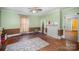 Playroom with wood floors and fireplace at 302 Charlotte St, York, SC 29745