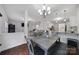 Open dining area with a table and chairs next to the kitchen at 8411 Washoe Pine Ln, Charlotte, NC 28215