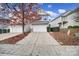 Two-story house with attached garage and driveway at 8411 Washoe Pine Ln, Charlotte, NC 28215