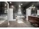Stylish bathroom with a soaking tub, dual vanity, mosaic backsplash, and sleek gray tile floors at 1115 Stony Point Rd, Kings Mountain, NC 28086