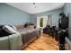 Spacious bedroom with hardwood floors and large window at 1115 Stony Point Rd, Kings Mountain, NC 28086