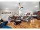 Bright and airy living room with hardwood floors, ample seating, an open layout, and seamless connection to the kitchen at 1115 Stony Point Rd, Kings Mountain, NC 28086