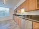 Modern kitchen features stainless steel appliances, granite countertops, and bright natural light at 1300 Queens Rd # 303, Charlotte, NC 28207