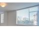 Bright living room with a large window offering natural light with exterior view at 1300 Queens Rd # 303, Charlotte, NC 28207