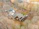 An aerial view of a home and its surroundings, showcasing the layout and ample outdoor space at 15215 Timberview Ln, Huntersville, NC 28078