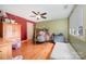 room with hardwood flooring, colorful walls, a trampoline, and a stuffed animal collection at 15215 Timberview Ln, Huntersville, NC 28078