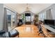 Bright office space with hardwood floors, a vaulted ceiling, and large windows, perfect for a productive work environment at 15215 Timberview Ln, Huntersville, NC 28078
