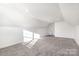 Spacious attic featuring plush carpet, recessed lighting, and white walls at 174 Bellingshire Dr, Mt Ulla, NC 28125