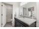Modern bathroom featuring an updated vanity, shower, and tub at 174 Bellingshire Dr, Mt Ulla, NC 28125