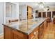 Spacious kitchen island featuring marble countertops and seating at 190 Poplar Grove Rd, Mooresville, NC 28117