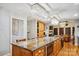 Kitchen island with marble countertops and room for seating at 190 Poplar Grove Rd, Mooresville, NC 28117