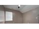 Simple bedroom with neutral walls and window coverings at 2221 Lexington St, Belmont, NC 28012