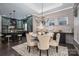 Elegant dining room features a charming chandelier and stylish seating at 2221 Lexington St, Belmont, NC 28012