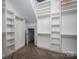 Large walk-in closet with ample shelving and hanging space at 2221 Lexington St, Belmont, NC 28012