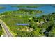 Aerial shot of the property located at 546 Little Cove Lane that has mature trees and lush landscape at 546 Little Cove Ln, Lake Wylie, SC 29710